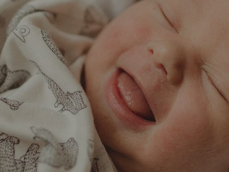 0 a 5 meses Bebê sorridente